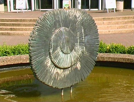 Ammonite design standing in middle of the pond
